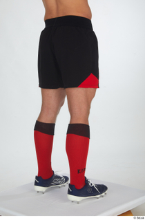 Erling black shorts red socks rugby boots rugby clothing sports…